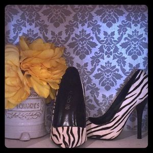Aldo Zebra print pumps